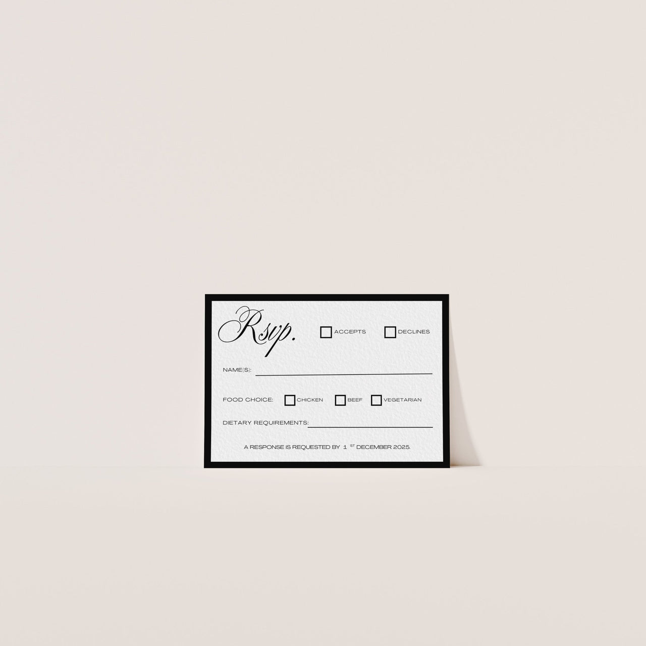 Elegant RSVP card in luxury black-and-white design – editable Canva wedding template from Fifth & Found