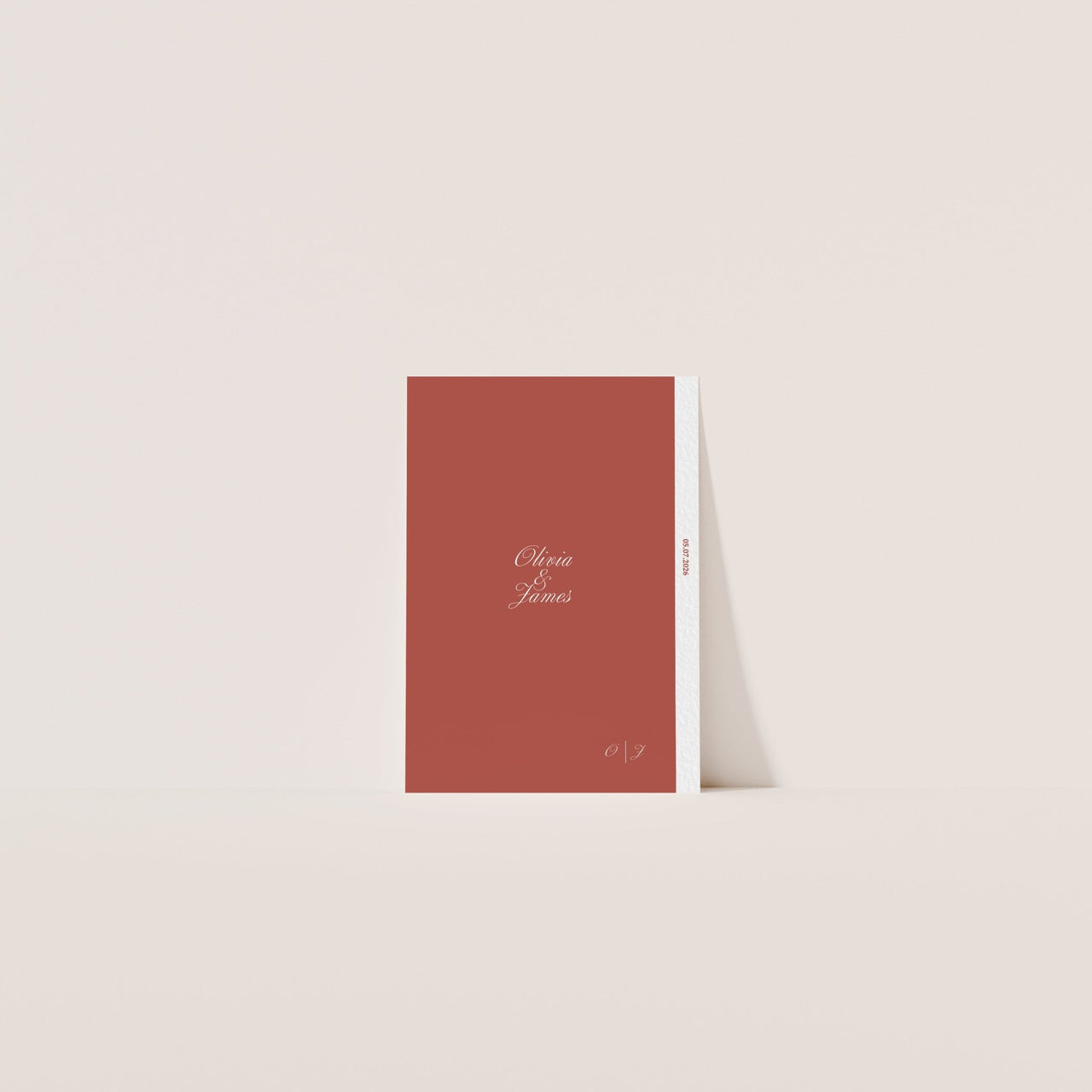 Luxury printed wedding invite featuring deep red and green tones – Finca & Flame suite for autumn and destination weddings